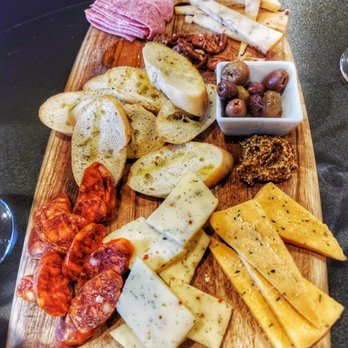 Poured - Wine, Beer & Bubbly - Charcuterie - Wine Bars Near Me - Mansfield, Texas