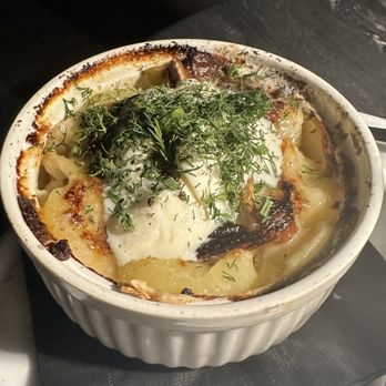 The Alchemist - Potato Tartiflette (just trust, it was bacon, brie and potato heaven) - Cocktail Bars Near Me - Geneva, Illinois