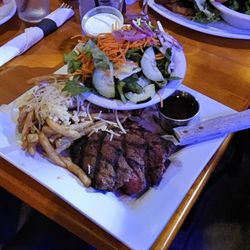 The Spot La Jolla - Flat iron steak dinner with side salad and garlic parmesan fries