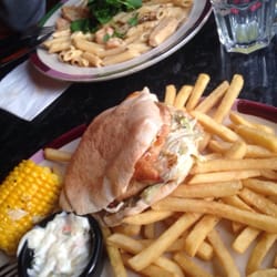 Frankie & Benny's UK - This is their "Grilled Chicken Pitta", and in the back is the "Chicken and Prawn Alfredo." Both of poor preparation.