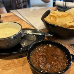 Chips, white queso, salsa Chips, white queso, salsa
