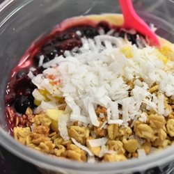 Oasis Nutrition- Modern Protein Cafe - Protein yogurt with fresh fruit, granola and shredded coconut.