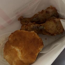 Look at this biscuit!! I wasn't even warned about how the biscuit quality would be or nothing the chicken was not fried all the way!!