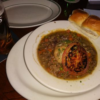 Durty Nelly's - Shepherd's Pie. Delicious! With lovely soft but grill toasted dinner rolls to sop the gravy. - Irish Pub Near Me - Costa Mesa, California Durty Nelly's - Shepherd's Pie. Delicious! With lovely soft but grill toasted dinner rolls to sop the gravy. - Irish Pub Near Me - Costa Mesa, California