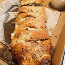 Village Pizzeria & Deli - Italian sausage Stromboli.