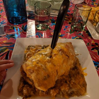North County - Smothered California burrito (see my dwarfed fingers and water glasses for size reference) - Mexican Near Me - Denver, Colorado