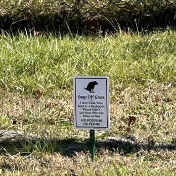 Smokin' Butts BBQ - Sign on Smokin Butts grass, lol - Barbeque Near Me - Pioneer, Tennessee