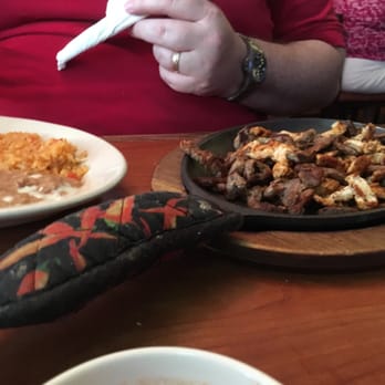 Senor Tequila - a woman eating a mexican meal - Mexican Near Me - Little Rock, Arkansas Senor Tequila - a woman eating a mexican meal - Mexican Near Me - Little Rock, Arkansas