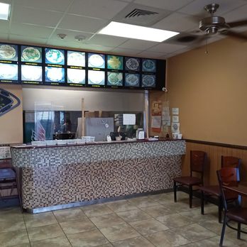 China Garden - Those are not actual pictures of dishes actually cooked in these walls. - Chinese Near Me - Leesburg, Florida