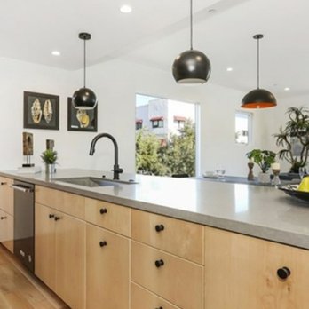 Eternal Stone Inc. - a kitchen with a large center island - General Contractors Near Me - South Gate, California
