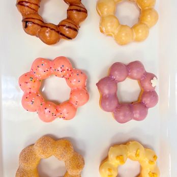 Mochidou - six different flavored donuts on a white plate - Bubble Tea Near Me - Hoffman Estates, Illinois Mochidou - six different flavored donuts on a white plate - Bubble Tea Near Me - Hoffman Estates, Illinois