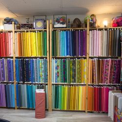 Tint-A Modern Makerspace - Interior. Rainbow fabric wall.