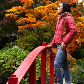 Kubota Garden - Here I am on one of the red bridges. See that big smile on my face? This place is magical. - Botanical Gardens Near Me - Seattle, Washington