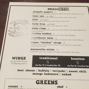 Two Wolves Taproom - a menu on a table - Pubs Near Me - Dallas, Oregon