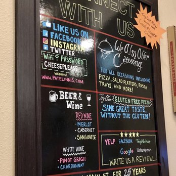 Patellini's Pizza - a menu on the wall - Pizza Near Me - Sarasota, Florida Patellini's Pizza - a menu on the wall - Pizza Near Me - Sarasota, Florida