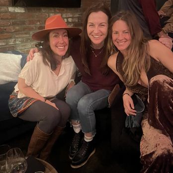 Portello Wine and Spirits - Hanging out on the cozy couch watching live music w/ girlfriends - Cocktail Bars Near Me - Bend, Oregon