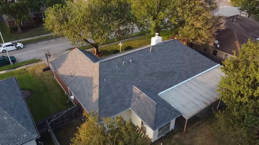 Slide of Spartan Roofing