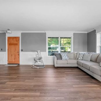 Z's County Construction - Flooring installation. Custom built solid wood entry door and wall detail trims. - General Contractors Near Me - Granite Falls, Washington