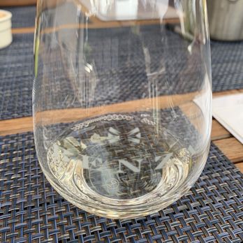 Benza Vineyards - a glass of wine on a table - Wineries Near Me - Hillsboro, Oregon Benza Vineyards - a glass of wine on a table - Wineries Near Me - Hillsboro, Oregon
