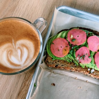 Oscura - Cappuccino, great. Avocado toast AMAZING. Comes with two slices of toast but I couldn't wait to try it.  Cannot wait to go back! - Coffee & Tea Near Me - Bradenton, Florida