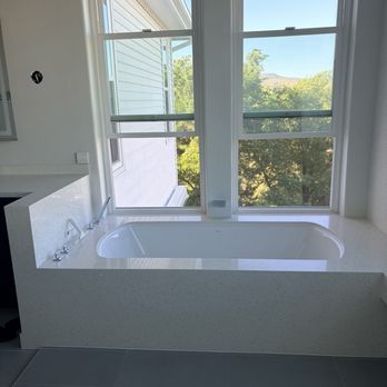 Dixon Tile & Stone - Jetted tub surround with mitered edges installed by Dixon Tile and Stone - Countertop Installation Near Me - Carson City, Nevada Dixon Tile & Stone - Jetted tub surround with mitered edges installed by Dixon Tile and Stone - Countertop Installation Near Me - Carson City, Nevada