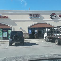 Building Exterior, including neighboring businesses.