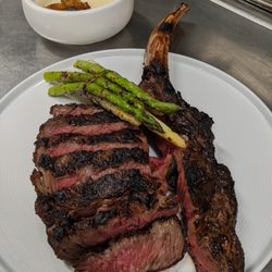 Private Chef Charleston - Dry aged beef tomahawk, asparagus bundle, roast garlic Youkon puree.