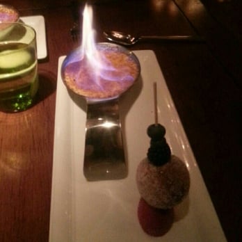 Talavera - Madagascar flambrulee with a lemon poppy seed fritter. - Steakhouses Near Me - Scottsdale, Arizona Talavera - Madagascar flambrulee with a lemon poppy seed fritter. - Steakhouses Near Me - Scottsdale, Arizona