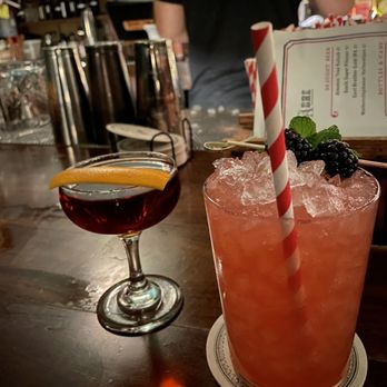 The Devil's Acre - Devil's Manhattan (left), blackberry mule (right) - Cocktail Bars Near Me - San Francisco, California