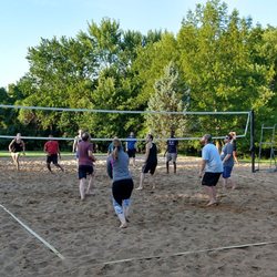 Quivira Park - People chasing a little ball while playing in the sand and not trying to run into the net.