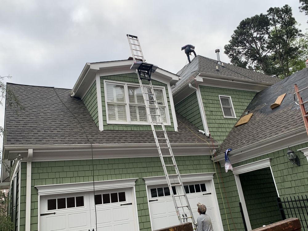 Slide of Noland Roofing