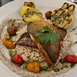 Dorado fish on couscous with grilled veggies