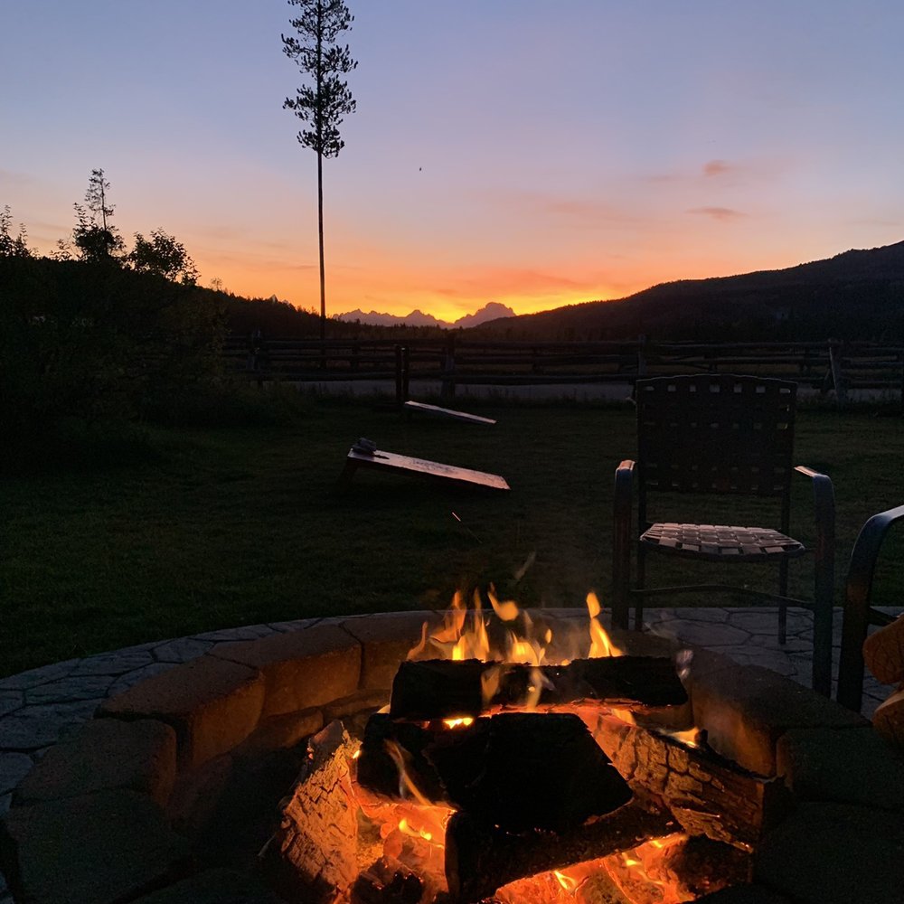 Turpin Meadow Ranch - Bonfire at sunset. - Resorts Near Me - Moran, Wyoming Turpin Meadow Ranch - Bonfire at sunset. - Resorts Near Me - Moran, Wyoming