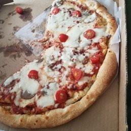 Sausage, bacon, onion, tomato 16 inch. Tasted good. Sausage, bacon, onion, tomato 16 inch. Tasted good.