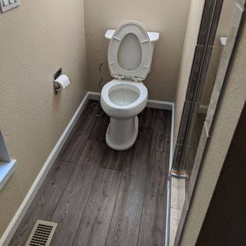 Kay Construction - Kay gave us beautiful new, matching vinyl tile (faux wood), reinstalled the toilet, and replaced all of the trim. - General Contractors Near Me Kay Construction - Kay gave us beautiful new, matching vinyl tile (faux wood), reinstalled the toilet, and replaced all of the trim. - General Contractors Near Me