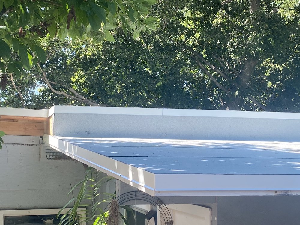 Slide of J&E ROOFING