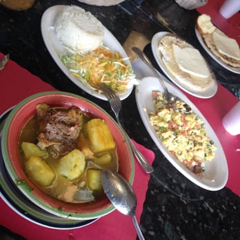 Antojos Colombianos - Oxtail soup (sancocho de cola) with a side of rice and salad.  Arepa w/Cheese and eggs with onion and tomatos.  (Huevos pericos) - Colombian Near Me - Harrison, New Jersey