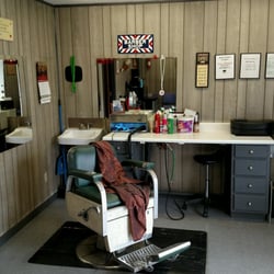 Dana's Barber Shop - New signs hung up around shop.  Definitely the best haircut in town!