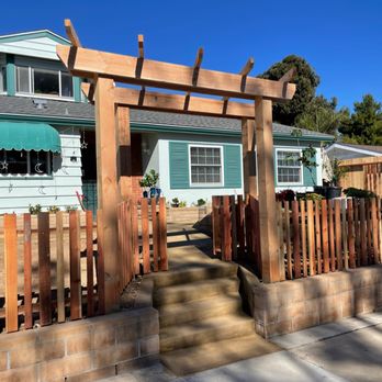 Sunlight Landscaping - the front of a house with a pergolated arbor - Landscaping Near Me Sunlight Landscaping - the front of a house with a pergolated arbor - Landscaping Near Me