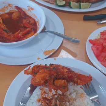 Palaus Restaurant - Langosta enchiladao with white rice and salad - Cuban Near Me - Tampa, Florida Palaus Restaurant - Langosta enchiladao with white rice and salad - Cuban Near Me - Tampa, Florida
