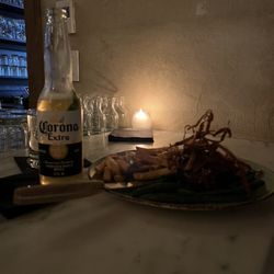 The Farm Table - Filet Mignon topped with crispy parsnips. A Corona to complete this dish.