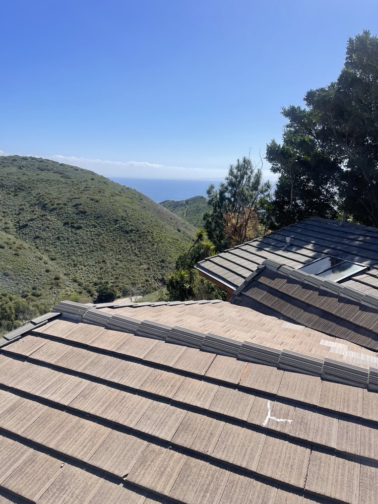 Slide of KAT Roofing