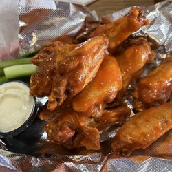 Kelly's Corner - Order of Wings, hot. And a soda was 14$