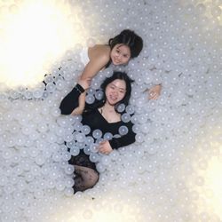 Color Factory - There's 3 different photo op locations in the ball pit, two laying down, one sitting up