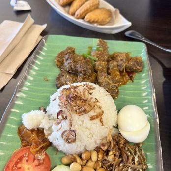 Seasons Kitchen USA - Nasi Lemak Beef Rendang was carefully made with different spices - Malaysian Near Me - Anaheim, California Seasons Kitchen USA - Nasi Lemak Beef Rendang was carefully made with different spices - Malaysian Near Me - Anaheim, California