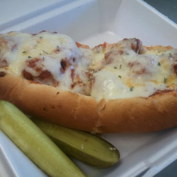 Luigi's Pizza of Appleton - a hot dog with cheese and pickles - Italian Near Me - Appleton, Wisconsin