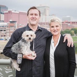 Derek Thompson DMD - 21st Century Dentistry - Dr.Dickerson with his wife, Julie, and their pup, Bruno.