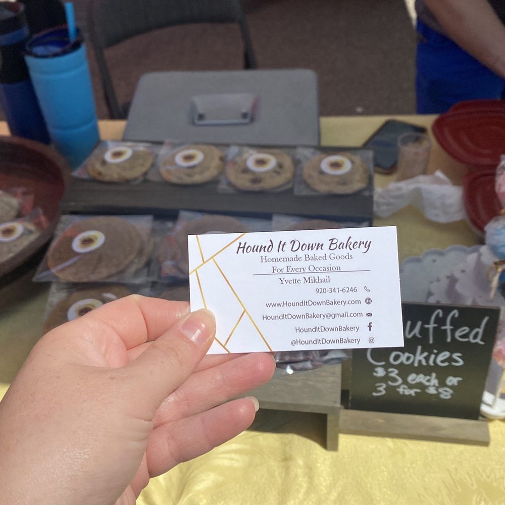 Northside Farmers Market - a hand holding a business card - Farmers Market Near Me - Madison, Wisconsin