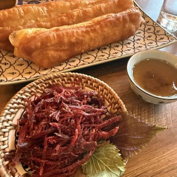 The Paper Bridge - Fritters in the back and water buffalo jerky in the front - Vietnamese Near Me - Portland, Oregon The Paper Bridge - Fritters in the back and water buffalo jerky in the front - Vietnamese Near Me - Portland, Oregon