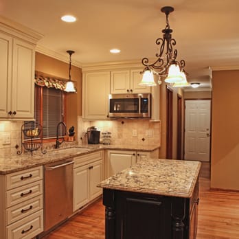 Lincorp/Borchert - French Country inspired kitchen with painted white cabinets and Cambria quartz tops. - General Contractors Near Me - Washington, Michigan